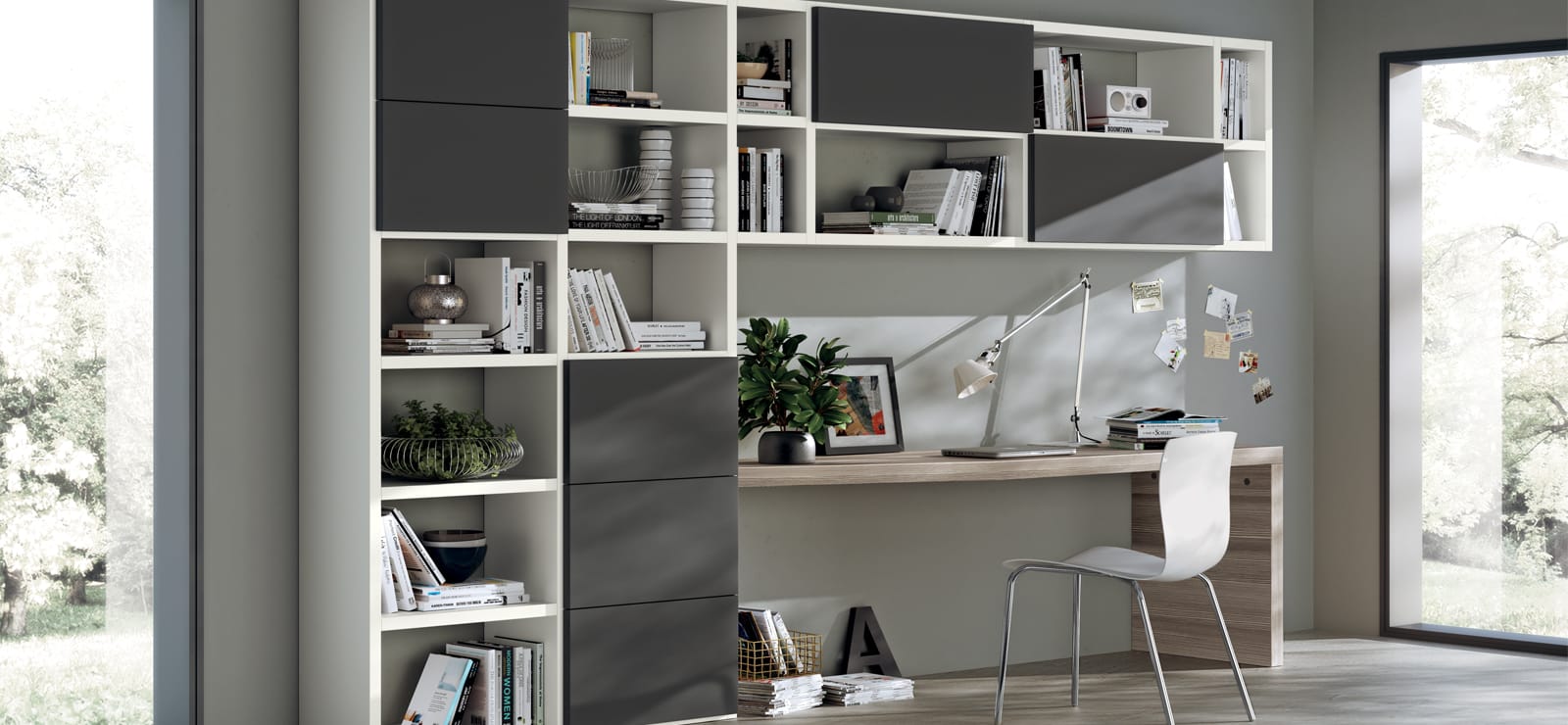Mueble de estudio a medida con estantería modular y escritorio en Tomelloso