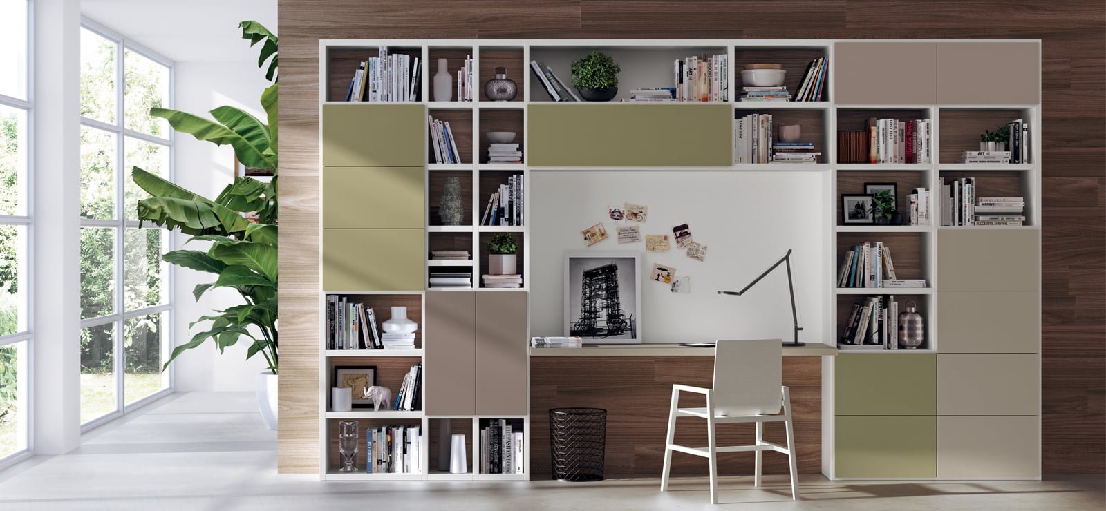 Mueble de salón modular a medida con estanterías, escritorio integrado y detalles en tonos oliva y beige en Tomelloso