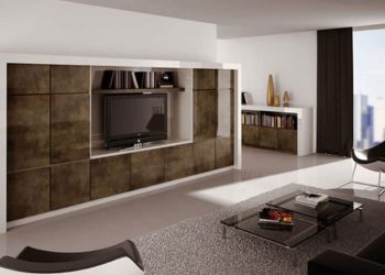 Mueble de salón moderno empotrado con armarios oscuros texturizados y espacio para televisión en Tomelloso